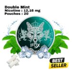 White Fox Double Mint dark teal can with fox emblem, surrounded by mint leaves, ice cubes and loose white pouches